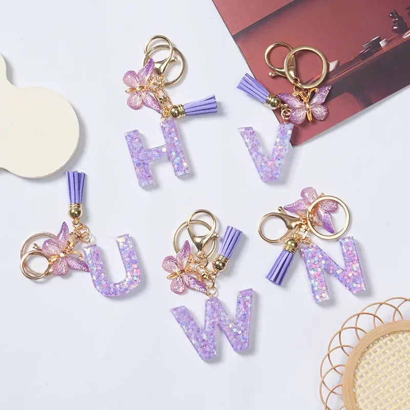 Cute Butterfly Tassel Letter Keychain Purple Stars Sequins Filled Resin A to Z Letter Keyring for Women Purse Charm Festive Gift