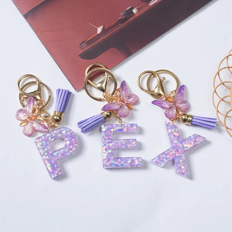 Cute Butterfly Tassel Letter Keychain Purple Stars Sequins Filled Resin A to Z Letter Keyring for Women Purse Charm Festive Gift
