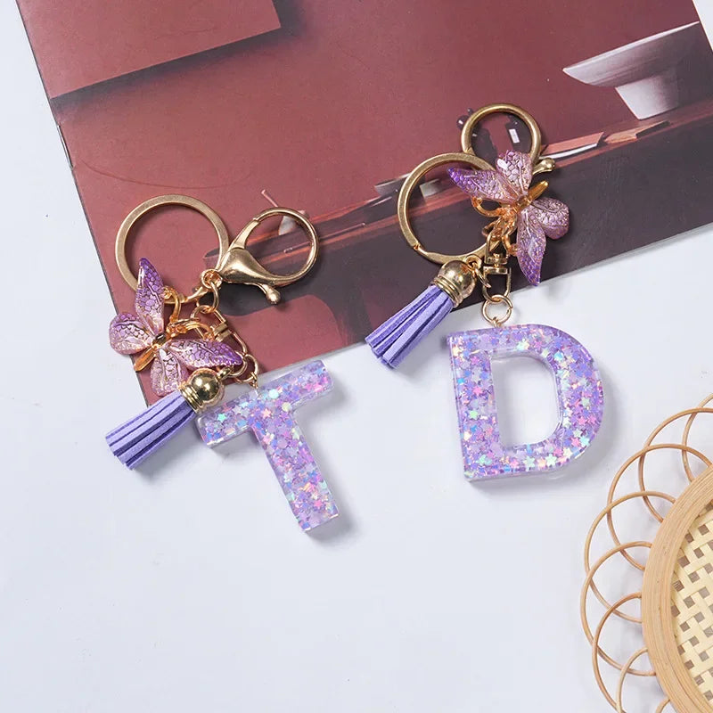 Cute Butterfly Tassel Letter Keychain Purple Stars Sequins Filled Resin A to Z Letter Keyring for Women Purse Charm Festive Gift