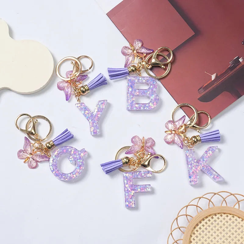 Cute Butterfly Tassel Letter Keychain Purple Stars Sequins Filled Resin A to Z Letter Keyring for Women Purse Charm Festive Gift