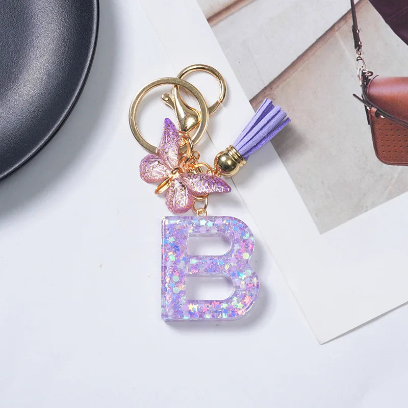 Cute Butterfly Tassel Letter Keychain Purple Stars Sequins Filled Resin A to Z Letter Keyring for Women Purse Charm Festive Gift