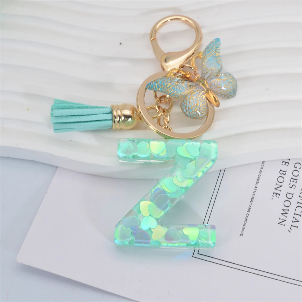 Fashion Green Tassel Butterfly 26Letter Keychain Heart-shaped Sequin Filled Resin Alphabet Keyring for Women Car Handbag Pendant