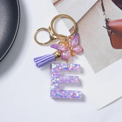 Cute Butterfly Tassel Letter Keychain Purple Stars Sequins Filled Resin A to Z Letter Keyring for Women Purse Charm Festive Gift