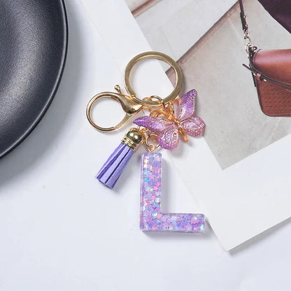 Cute Butterfly Tassel Letter Keychain Purple Stars Sequins Filled Resin A to Z Letter Keyring for Women Purse Charm Festive Gift
