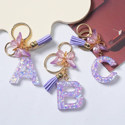 Cute Butterfly Tassel Letter Keychain Purple Stars Sequins Filled Resin A to Z Letter Keyring for Women Purse Charm Festive Gift